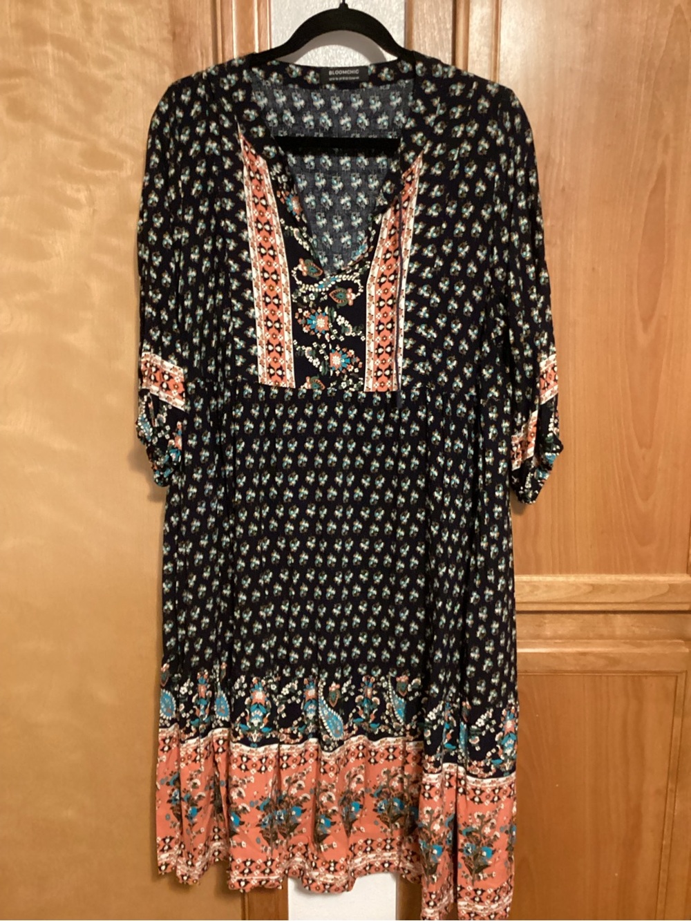 BloomChic Black Midi Dress with Coral and Teal Border